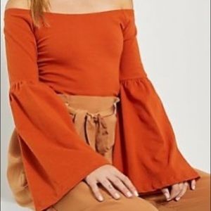 Orange off shoulder flare sleeved top from Rue21
